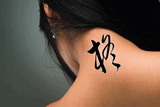 Japanese Holly Tattoo by Master Japanese Calligrapher Eri Takase